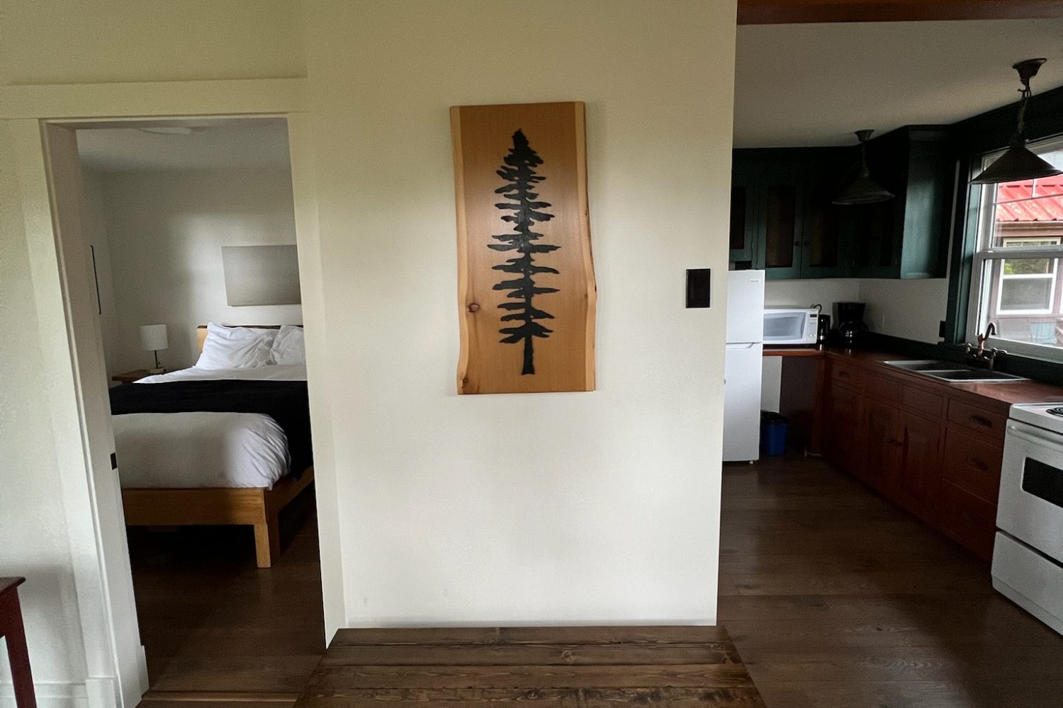 Sitka cabin kitchen and bedroom